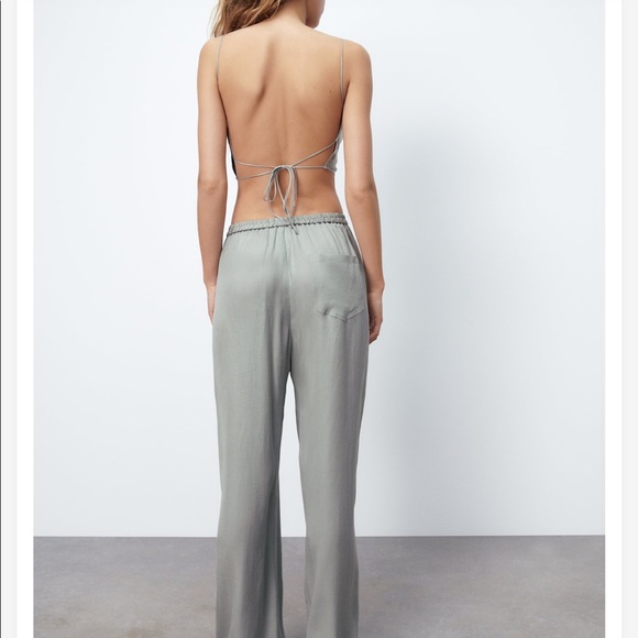 Grey crop top worn strappy backless detail. Matching set also available - Picture 2 of 9